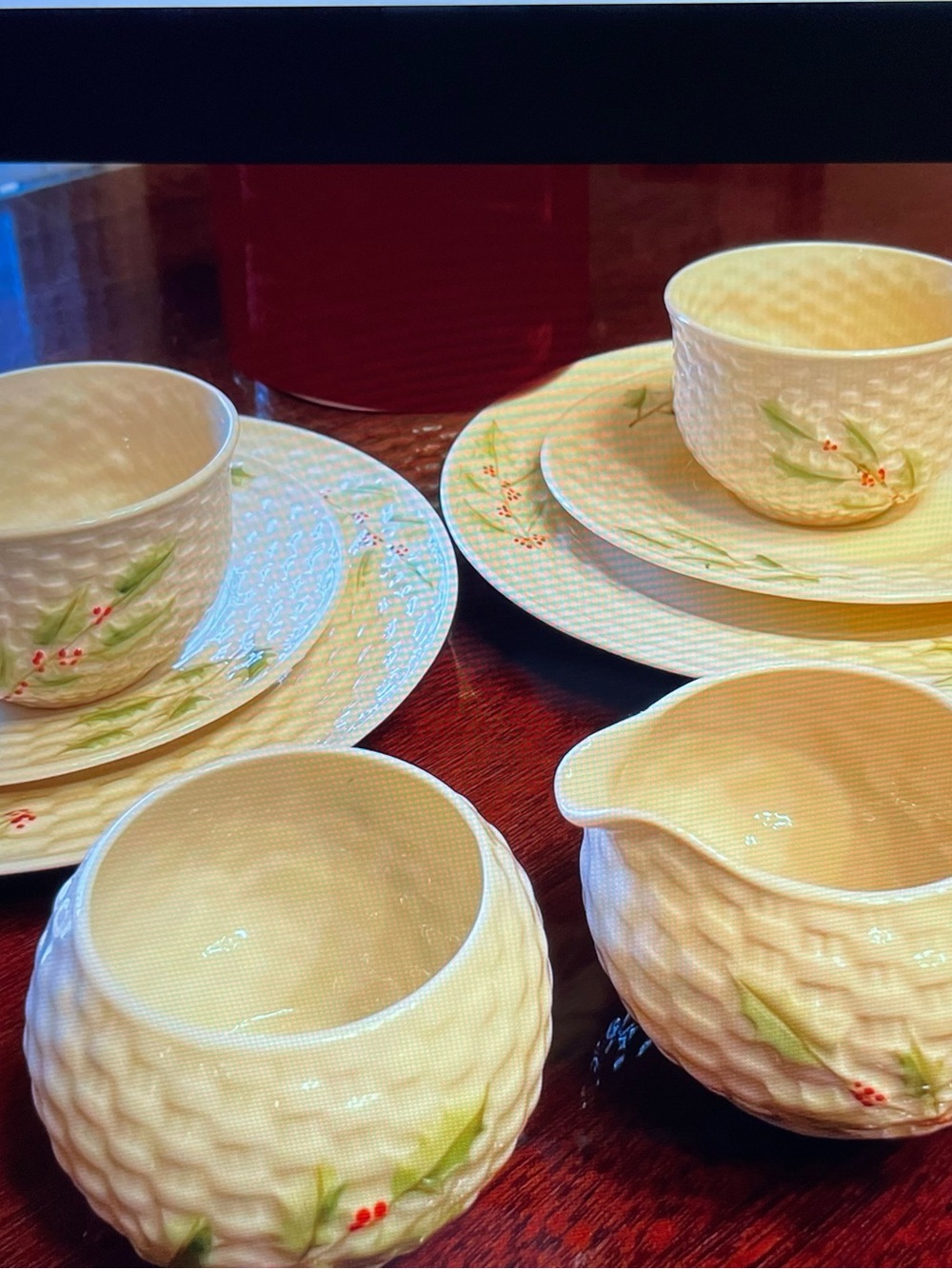 Irish Belleek Parian 2cups,2 saucers,2 tea plates
Cream and sugar.vintage